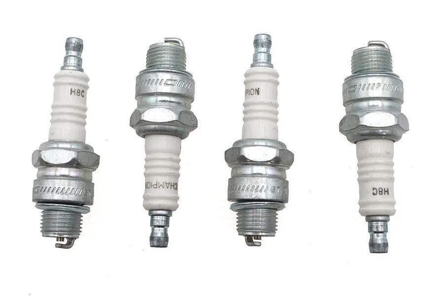 Champion Copper Plus Spark Plugs Part Number 587 for Harley Davidson XL - Pack of 4 by Champion
