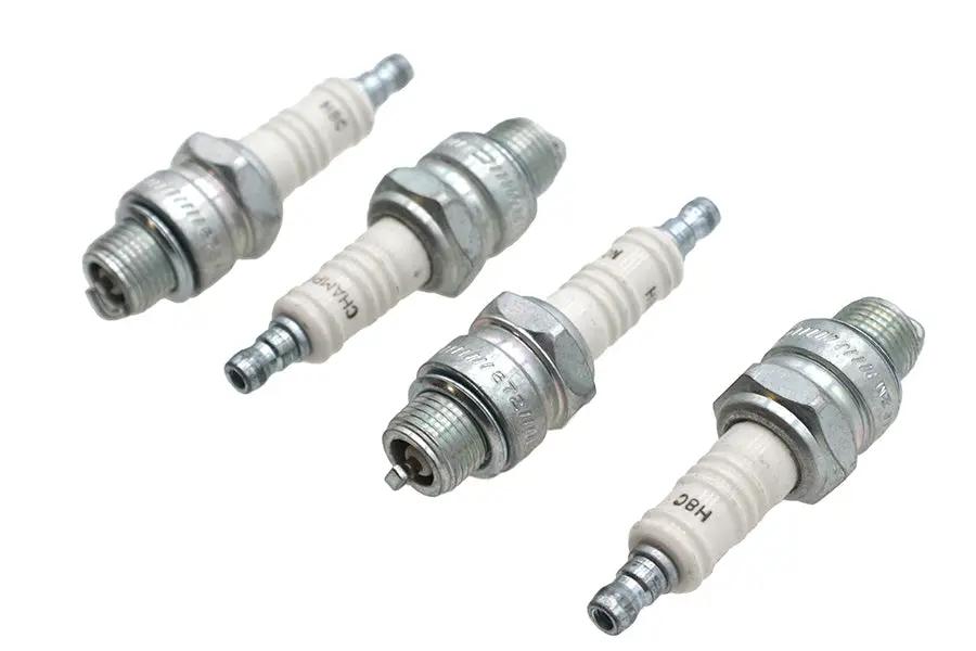 Champion Copper Plus Spark Plugs Part Number 587 for Harley Davidson XL - Pack of 4 by Champion
