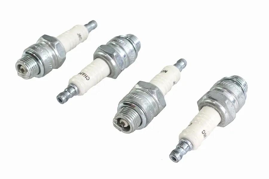 Champion Spark Plug Part Number 823 for Harley Davidson FL (Short Reach) - Pack of 4 by Champion