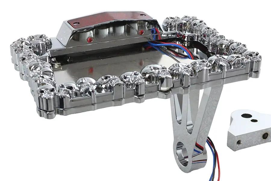 V-Twin Chrome Skull Style Tail Lamp Assembly with Side Mount Horizontal Skull Plate Frame by V-Twin