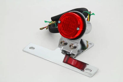 Wyatt Gatling 1 Inch Round Tail Lamp with 12 Volt Bulb by Wyatt Gatling